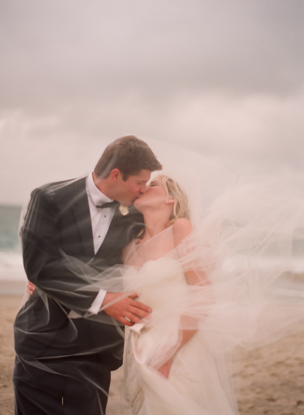 kissing bride and groom wedding photo by Elizabeth Messina Photography